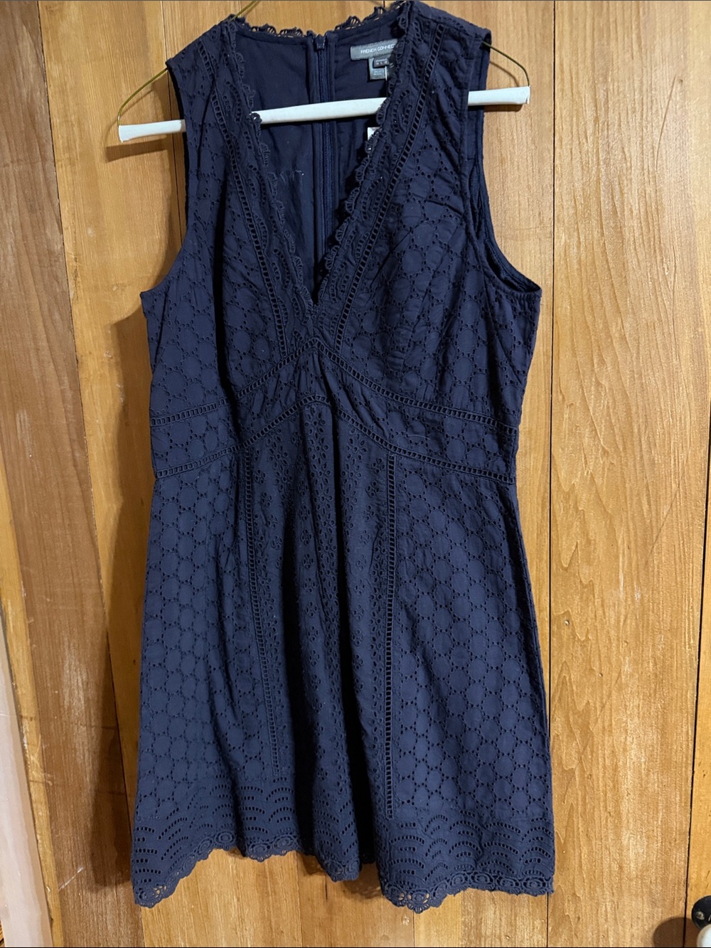 French Connection navy blue eyelet mini dress.  Lined, new with tags. Size 10.